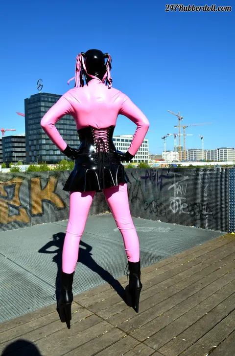 RubberDoll: Brunette Flaunts Latex Skirt Outdoors – photo 11 of 15