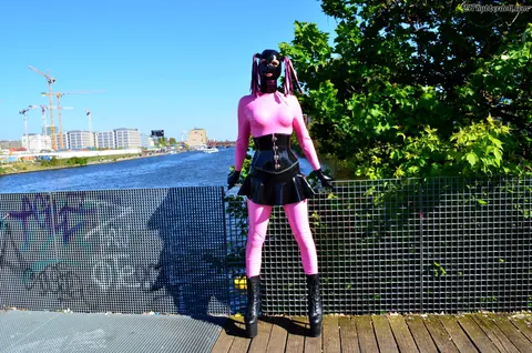 RubberDoll: Brunette Flaunts Latex Skirt Outdoors – photo 6 of 15