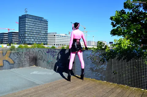 RubberDoll: Brunette Flaunts Latex Skirt Outdoors – photo 4 of 15