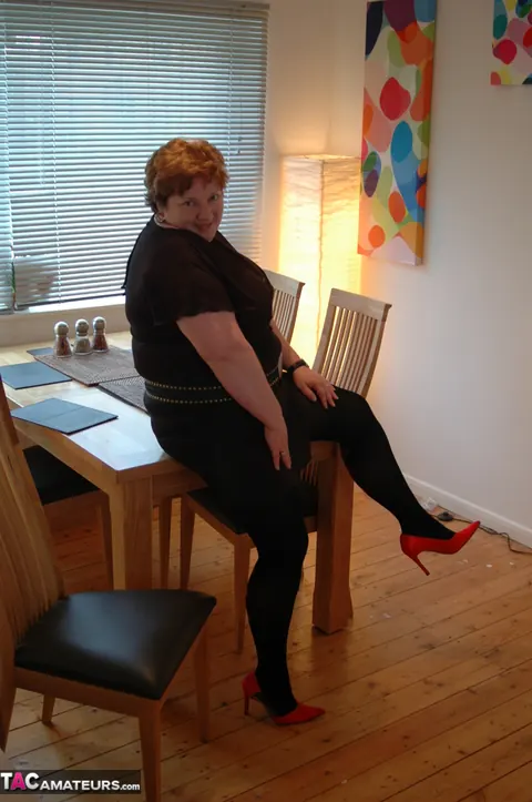 Chris 44g: Curvy Redhead MILF in Stockings Bares Her Big Tits and Tattoos – photo 2 of 20