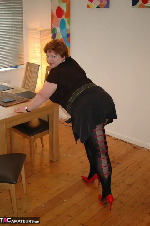 Chris 44g: Curvy Redhead MILF in Stockings Bares Her Big Tits and Tattoos – photo 3 of 20