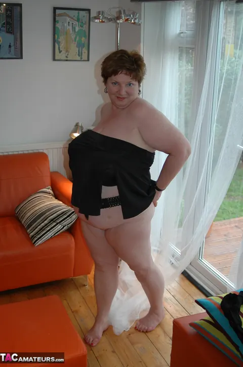 Chris 44g: Curvy Redhead MILF in Stockings Bares Her Big Tits and Tattoos – photo 20 of 20