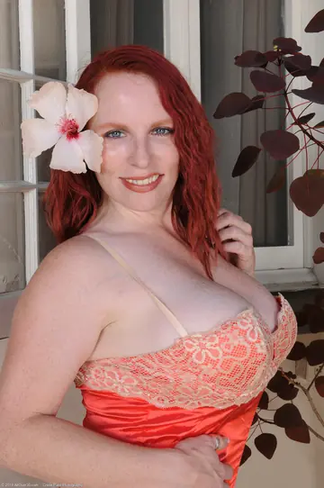 Redhead MILF in Panties and Heels Spreads Her Pussy