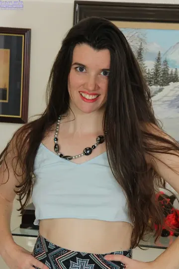 Busty Brunette Amateur Strips Out of Her Panties to Show Her Hairy Pussy