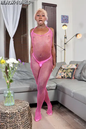 Blonde Ebony Trans Woman Undresses and Poses Nude