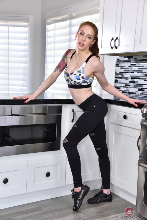 Anna De Ville: Petite Redhead Poses and Spreads Her Legs in the Kitchen – photo 2 of 21