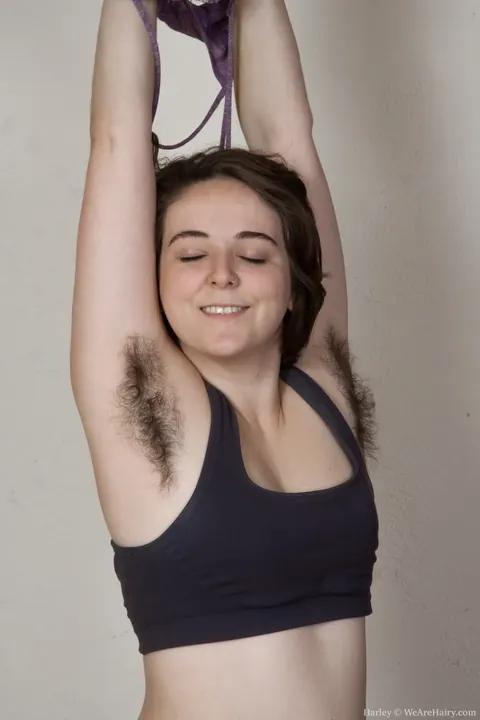 Hairy Brunette Flashes Armpits and Pussy at the Gym – photo 2 of 17