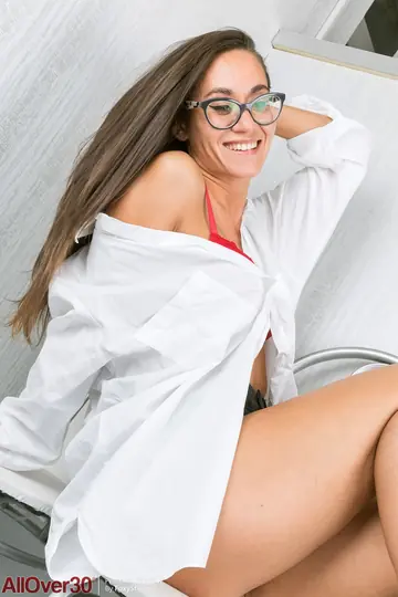 Skinny MILF Strips Out of Her Shorts and Glasses