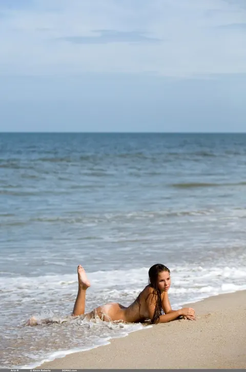 Petite European Strips Nude on the Beach – photo 15 of 20