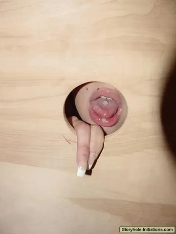 Busty Blonde MILF Sucks Cock Through Gloryhole