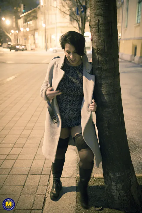 Aisha Bahadur: Busty Czech MILF Flashes Stockings and Boots in Public – photo 12 of 20
