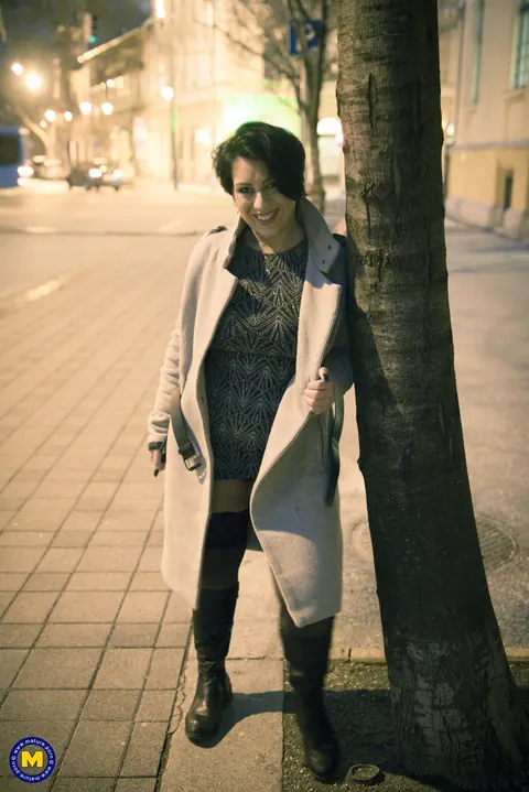 Aisha Bahadur: Busty Czech MILF Flashes Stockings and Boots in Public – photo 11 of 20