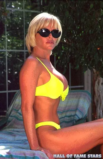 Busty Blonde MILF Strips Off Her Bikini by the Pool and Spreads
