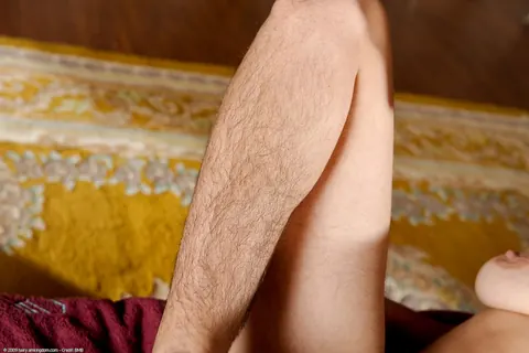 Short-Haired Babe Undresses and Spreads Her Hairy Pussy – photo 12 of 21