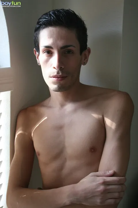 Slim Hairy Man Strips Nude on the Bed – photo 1 of 20