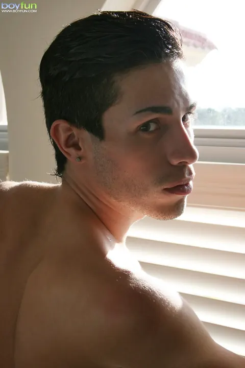 Slim Hairy Man Strips Nude on the Bed – photo 4 of 20