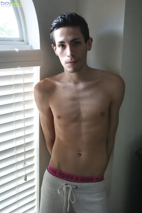 Slim Hairy Man Strips Nude on the Bed – photo 2 of 20