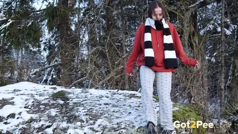 European Brunette Squats and Pisses on Snowy Ground – photo 15 of 15