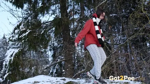 European Brunette Squats and Pisses on Snowy Ground – photo 14 of 15