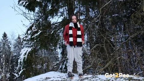 European Brunette Squats and Pisses on Snowy Ground – photo 2 of 15