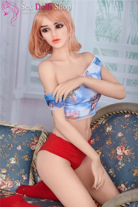 Slim Woman Poses in Socks on the Sofa – photo 12 of 21