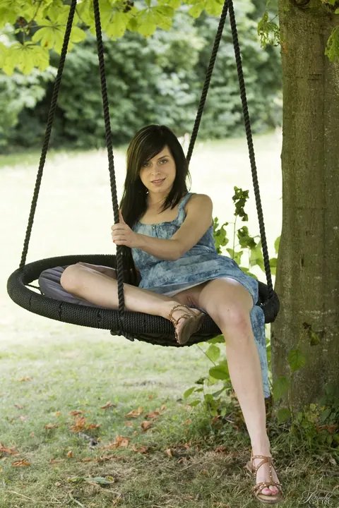 Daniela Rose: Slim Brunette Spreads Her Shaved Pussy Outdoors on a Swing – photo 5 of 17