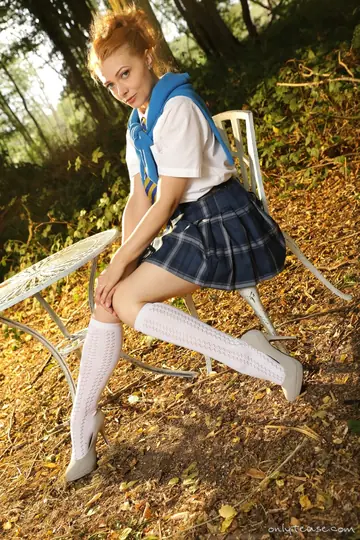 Scarlett Foxett – Redhead PAWG Sheds Her Uniform in the Forest and Keeps Socks