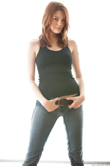 Redhead Strips Out of Her Jeans to Show Her Big Natural Tits