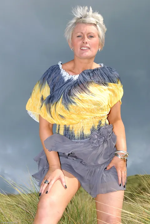 Short-Haired Mature Blonde Spreads Her Pierced Pussy on the Beach – photo 7 of 20