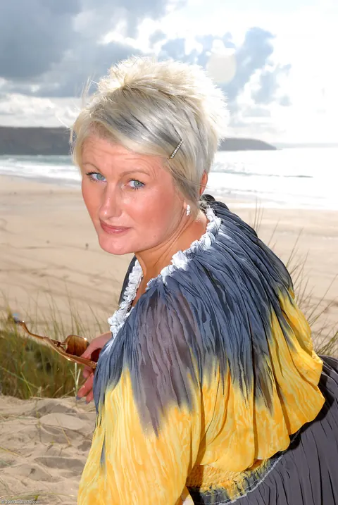Short-Haired Mature Blonde Spreads Her Pierced Pussy on the Beach – photo 3 of 20