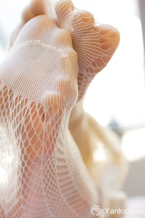 Petite Slim Hairy Babe Masturbates with a Dildo in Fishnet Pantyhose – photo 10 of 17