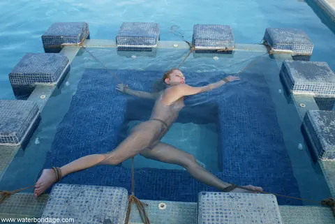 Jenny Lee: Tall Brunette MILF Bound in Bondage Restraints by the Pool – photo 2 of 20