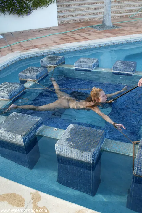 Jenny Lee: Tall Brunette MILF Bound in Bondage Restraints by the Pool – photo 9 of 20