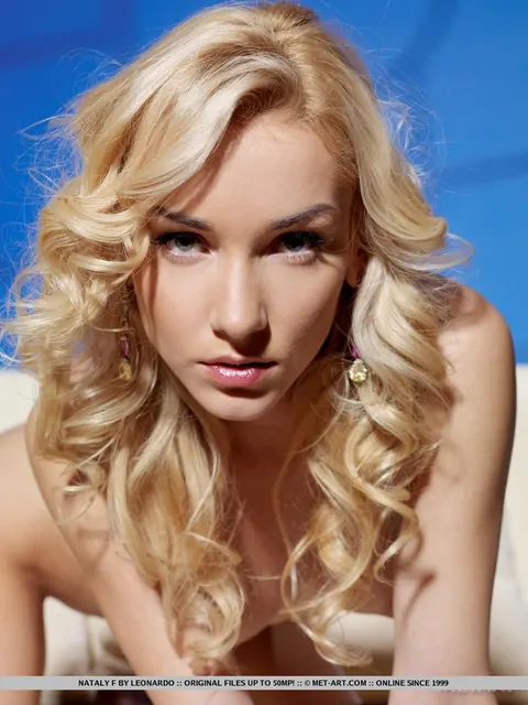 Curly Blonde in Stockings Spreads Her Shaved Pussy – photo 18 of 18