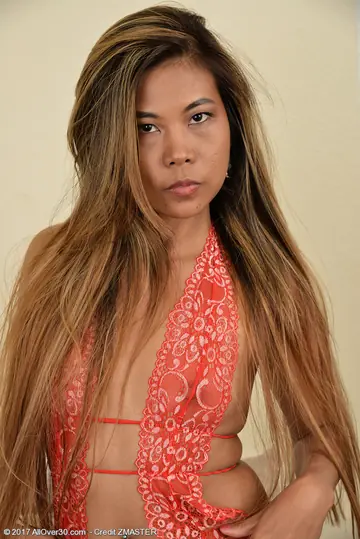 Slim Asian MILF Strips Off Her Lingerie and Shorts to Expose Her Shaved Pussy