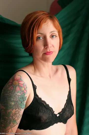Woman Undresses to Show Her Hairy Bush and Poses Nude