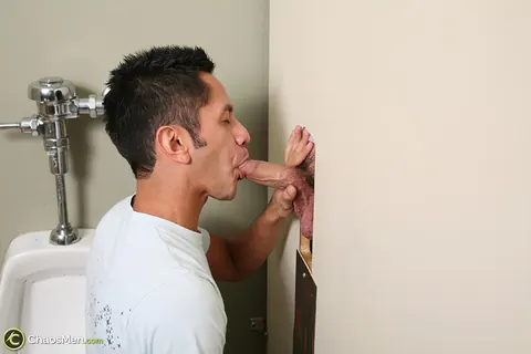 Man Gets His Cock Sucked Through a Gloryhole – photo 19 of 20