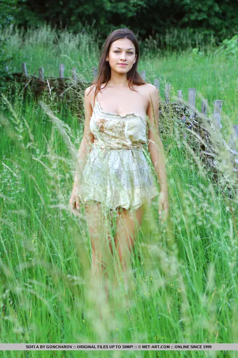 European Brunette Reveals Her Big Tits in a Forest – photo 6 of 18