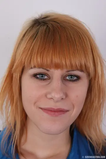 Czech Redhead Glances Back and Spreads Her Pussy