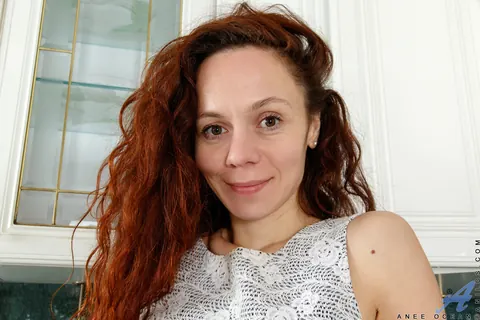Anee Ocean: Tattooed Redhead MILF Oils Her Body and Spreads – photo 2 of 16