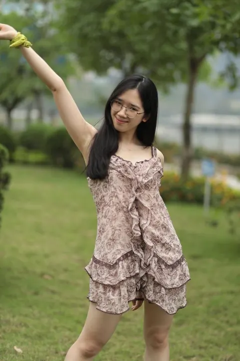 Petite Asian Woman Lifts Her Short Dress Outdoors – photo 19 of 20