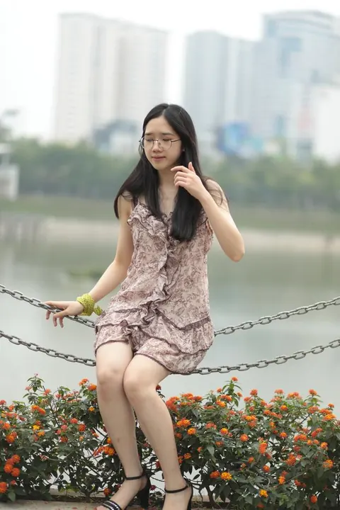 Petite Asian Woman Lifts Her Short Dress Outdoors – photo 10 of 20