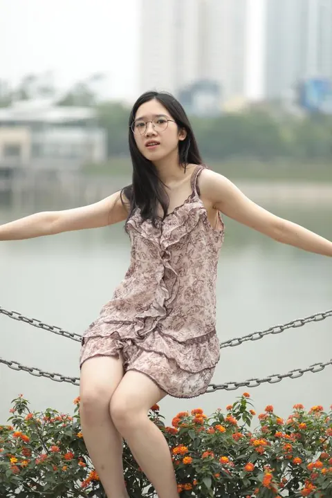 Petite Asian Woman Lifts Her Short Dress Outdoors – photo 3 of 20