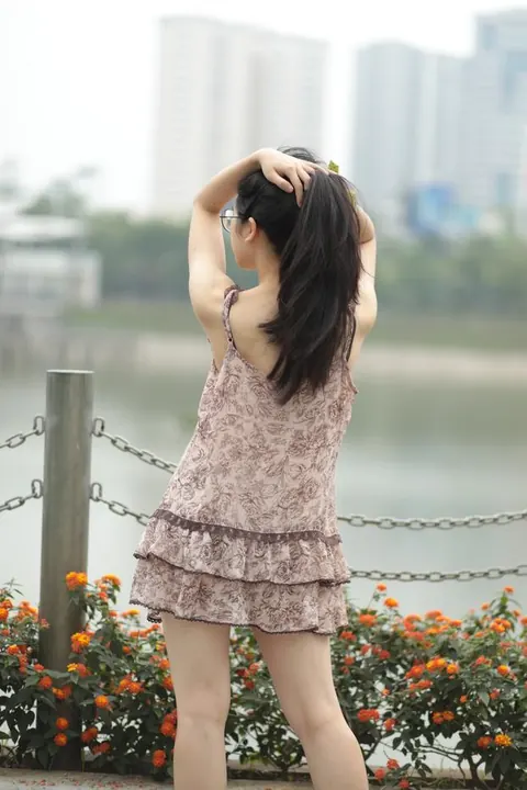 Petite Asian Woman Lifts Her Short Dress Outdoors – photo 17 of 20