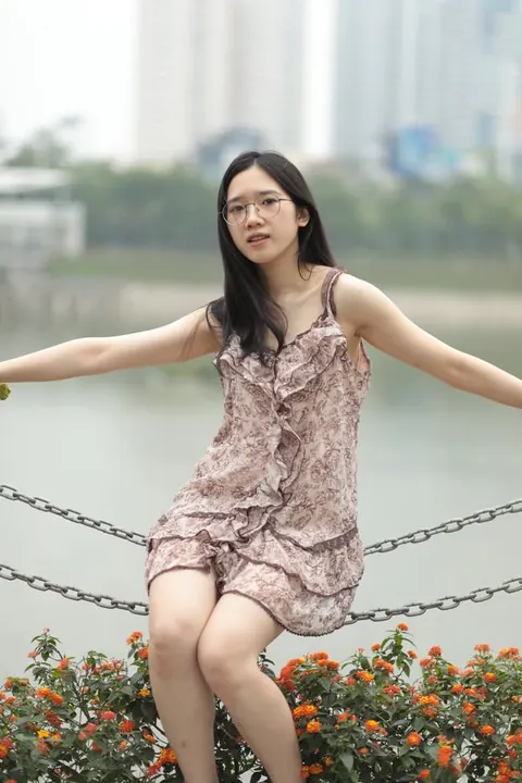 Petite Asian Woman Lifts Her Short Dress Outdoors – photo 2 of 20