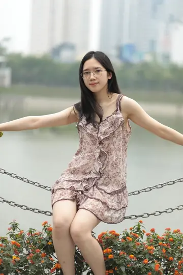 Petite Asian Woman Lifts Her Short Dress Outdoors