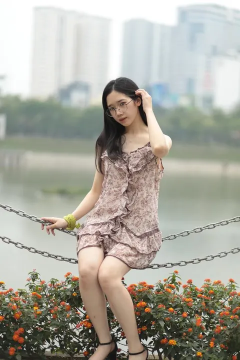 Petite Asian Woman Lifts Her Short Dress Outdoors – photo 9 of 20