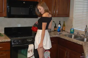 Brunette Kisses and Undresses in Lesbian Gallery