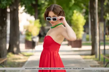 Short-Haired Brunette in Glasses Spreads Her Pussy Outdoors