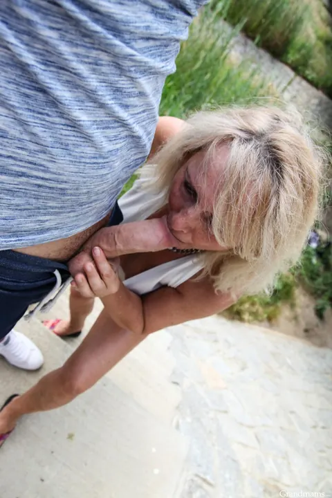 Koko Blond: Busty Blonde MILF in Glasses Sucks Cock Outdoors – photo 7 of 20